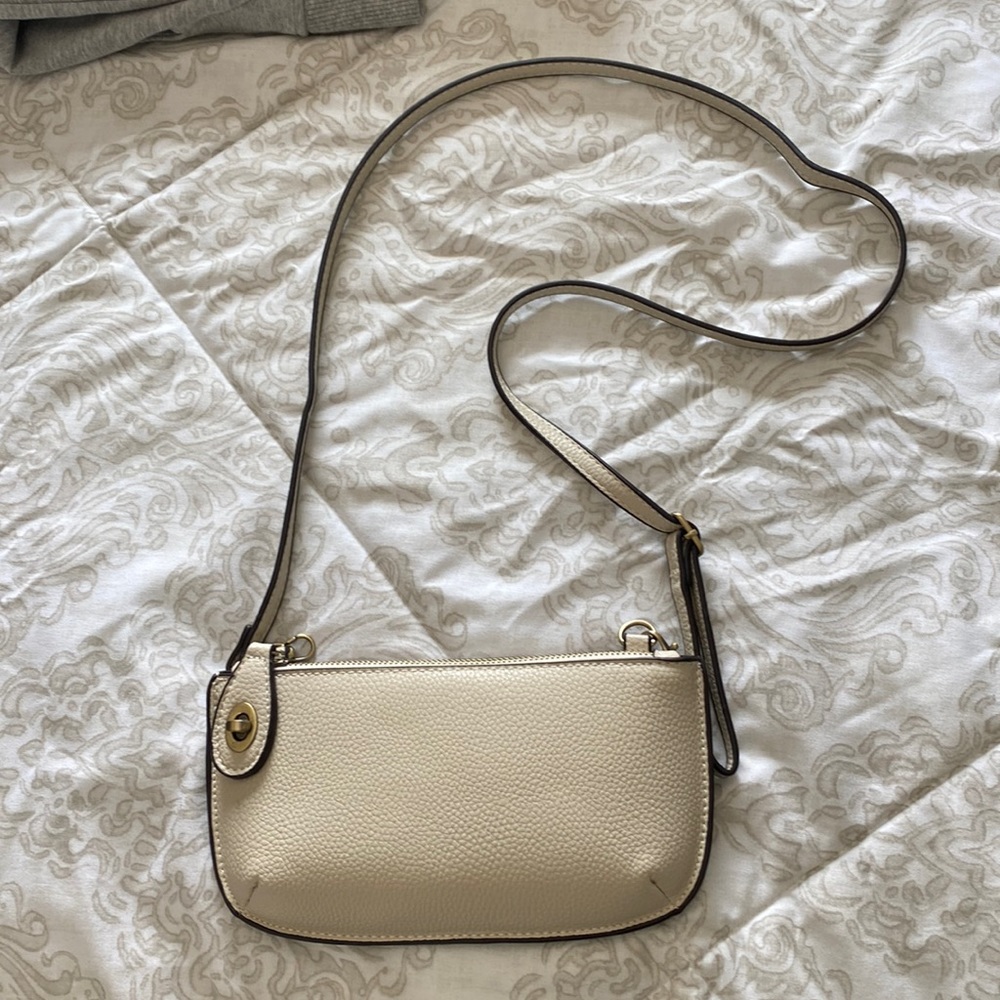 Cream colored clutch/ side bag